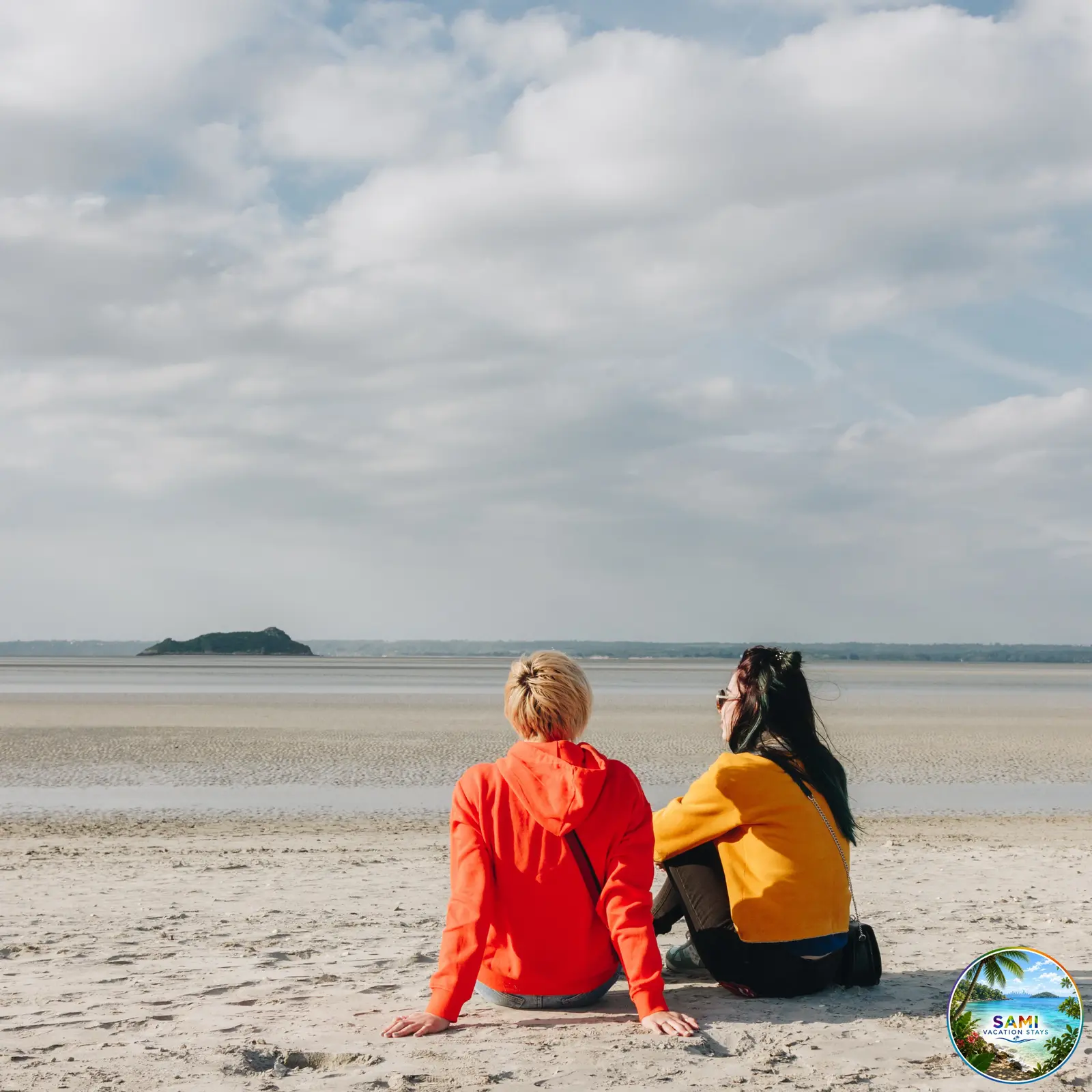 Friends relaxing together on the beach