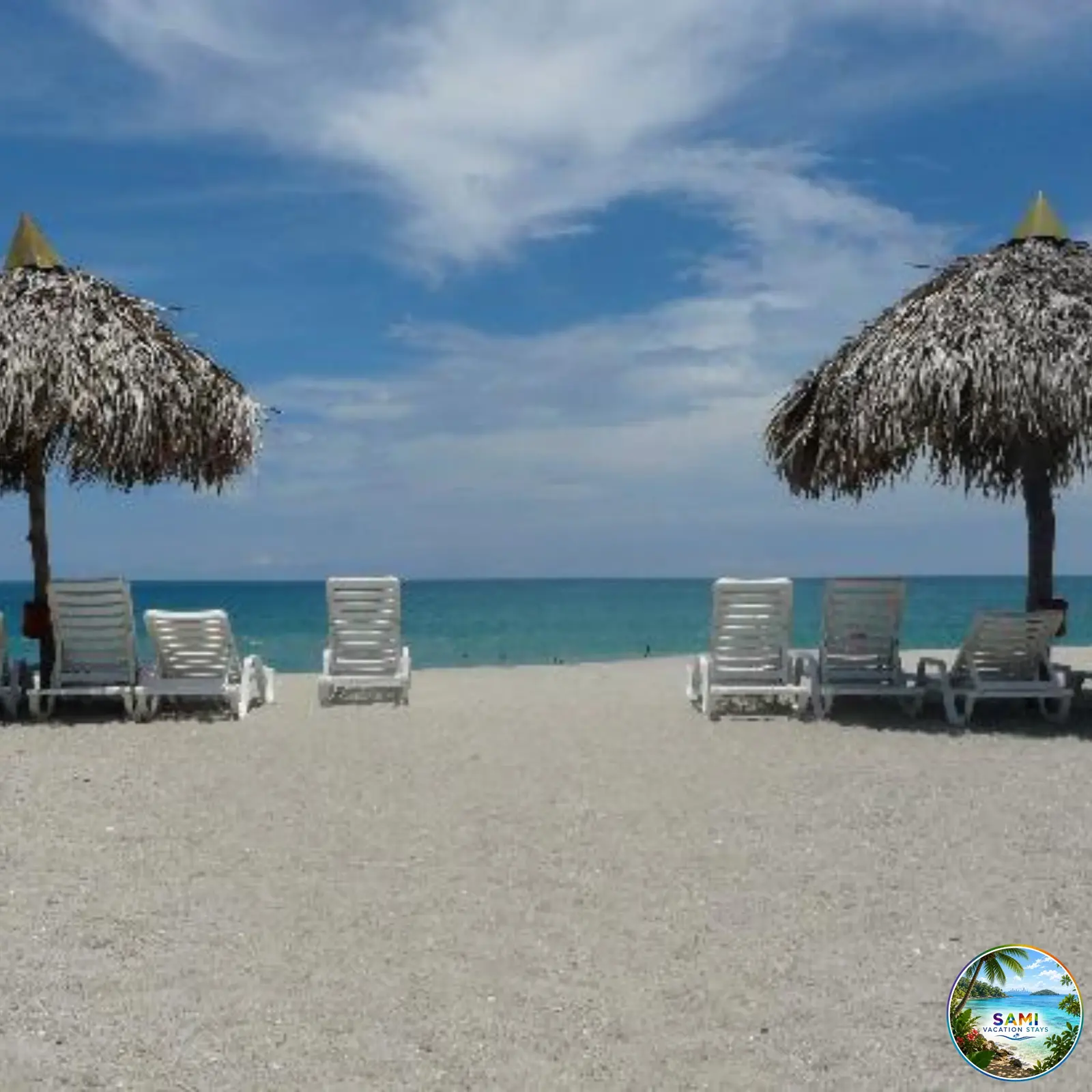 Palapa umbrellas and beach chairs by the sea